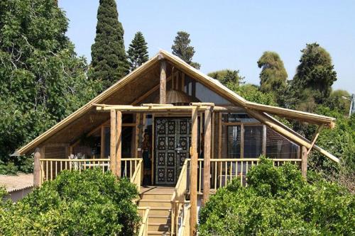 Liman House | ביקתפוז וקלמנטינה- מתחם בקתות וסוויטות עם ג'קוזי פרטי ובריכה משותפת מחוממת ומקורה
