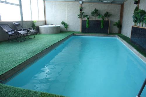 Buq'ata Apartment | נוף הכפר - 6 חדרי אירוח לזוגות ומשפחות עם ג'קוזי ובריכה מחוממת משותפים במתחם