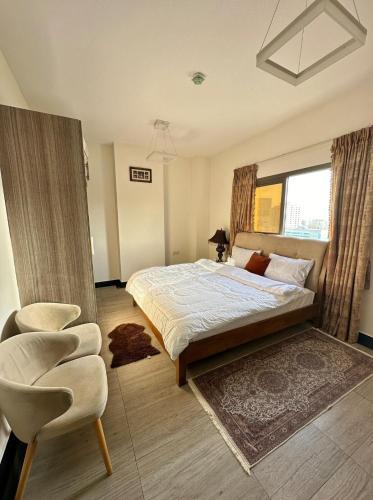 Sharjah Apartment | 1-Bedroom Family Apartment with Balcony in Sharjah