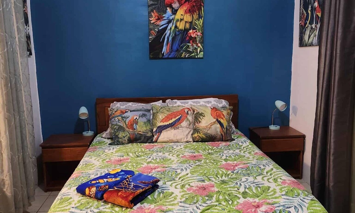 Coco Sunset Hills Apartment | A tropical beach is a three-minute walk away