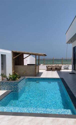 Al Ashkharah Ski Chalet | Acacia Beach Villa