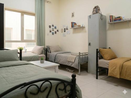 Sharjah Hostel | ALEX Hostel - Bed in a shared room - H101