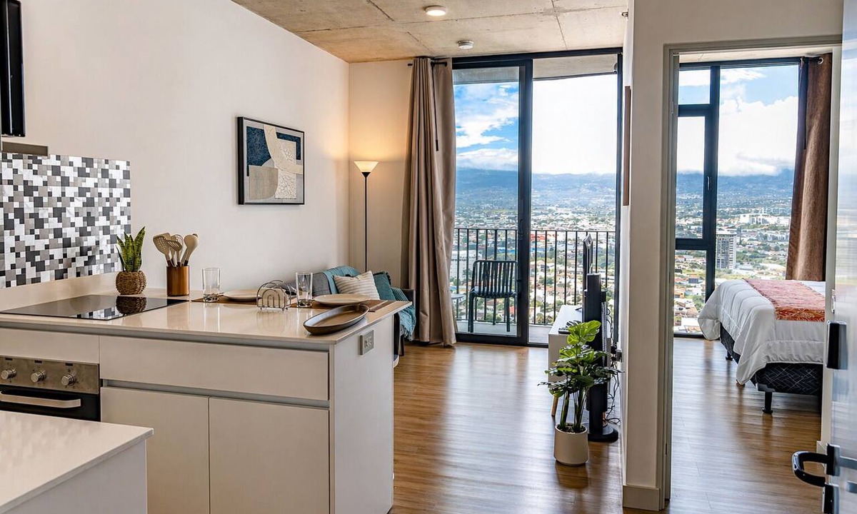 La California Apartment | Balcony with a panoramic view on the 27th floor in Barrio Escalante