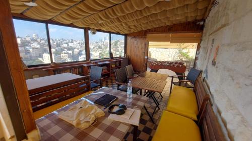 Jabal Al-Hussein Hostel | Carob Hostel