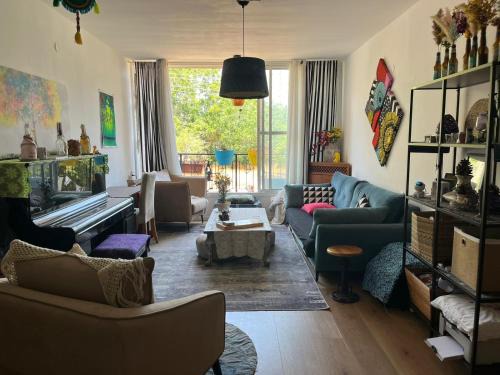 Ness Ziona Apartment | Charming 3BR with Piano, lovely Ness Ziona