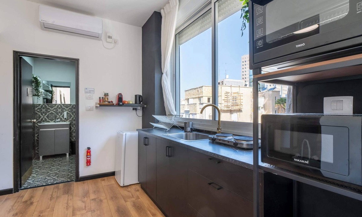 Haifa Apartment | Ehad Ha'am Haifa Urban Design Suite by Shay’s Urban