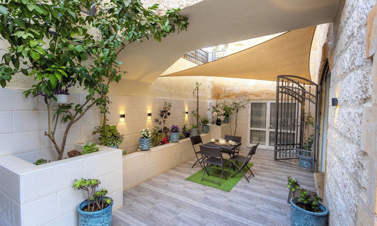 Suwailih Apartment | Elegant 2BR Family Oasis with Lush Private Garden