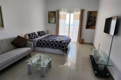 Al Hamra Village Apartment | Home away from Home