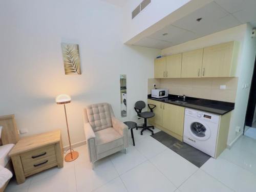 Dubai Sports City Apartment | Mahenti - Elite 1 · Large balcony with all u need