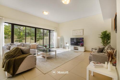 Dubai Villa | Manzil - 4BR Villa in Prime Location with Private Garden