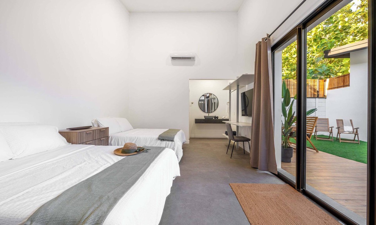 Pinilla Apartment | Pinilla Living Studios 3, Secluded bedroom, exclusive deck and pool