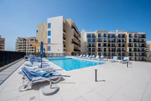 Al Hamra Village Apartment | Private Beach Studio-Yacht Club-Work Space-Pool-Gym