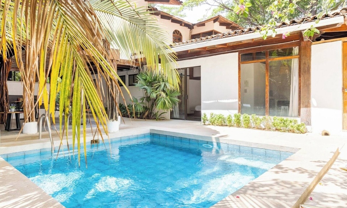 Playa Grande Apartment | Private room with pool, walking distance to beach