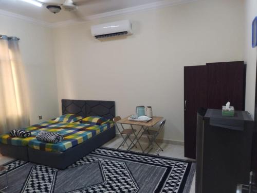 Al Mazra Hostel | Private Rooms For Rent Near Airport - Raha Hostel