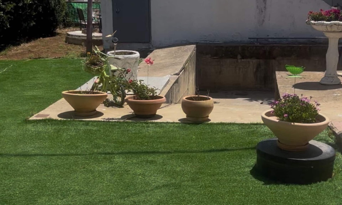Qiryat Shemona Apartment | Renovated one room unit with a bomb shelter and a garden.