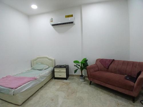 Muscat Apartment | Room with private bathroom in a flat-ladies only