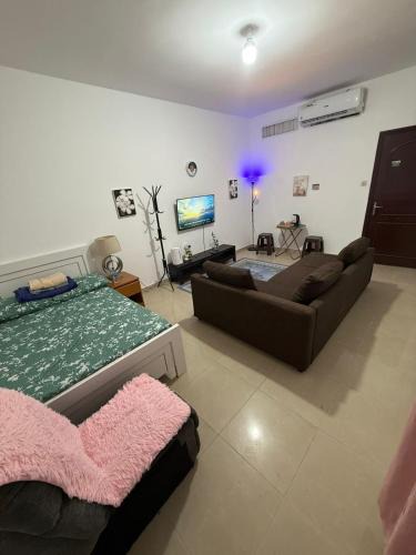 Madinat Zayed House | Room with toilet and tv for couple