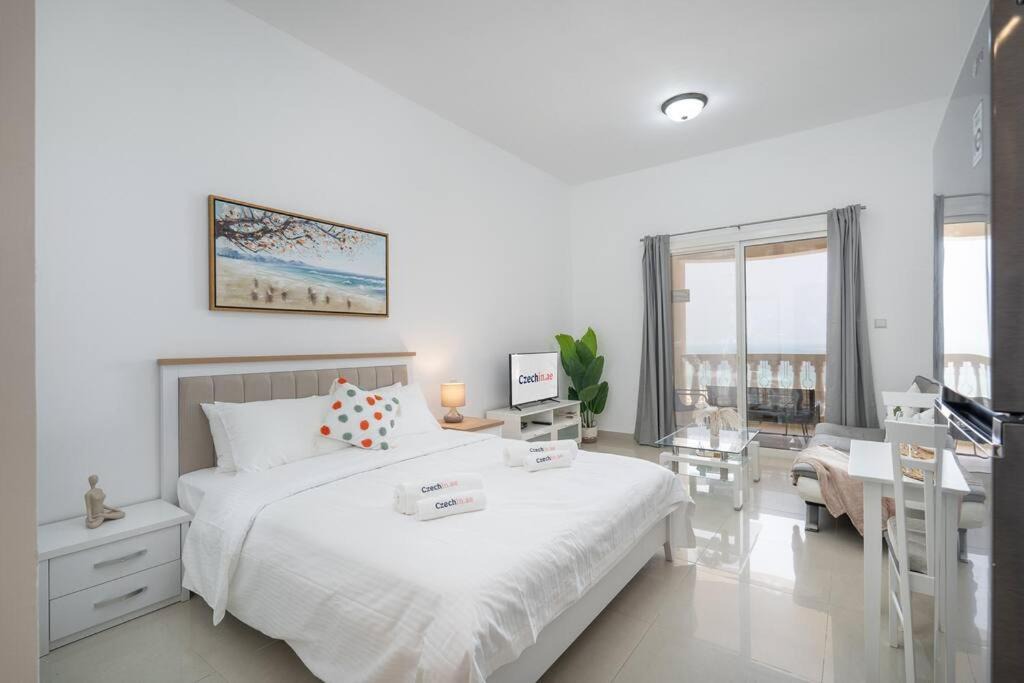 Al Hamra Village Apartment | Serene Studio & Sea View & Brand New Listing