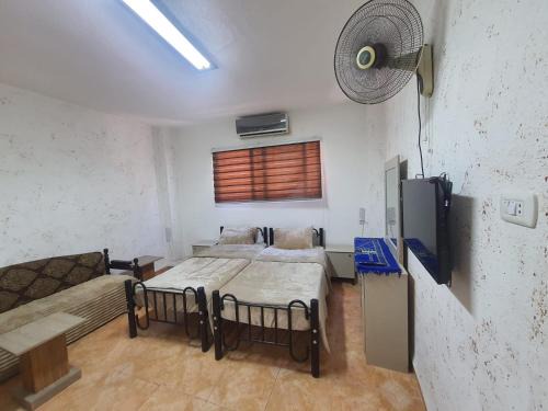 Jabal Al-Hussein Apartment | stone house