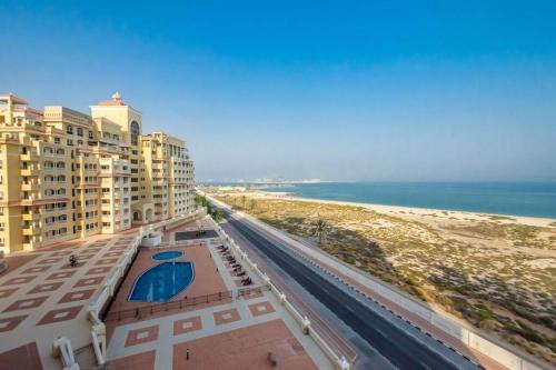 Al Hamra Village Apartment | The Seaside Studio Sanctuary