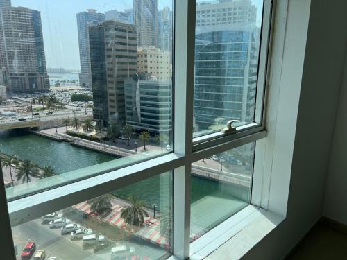 Al Majaz Apartment | Top Rated Award Winning 1BR with Sea View