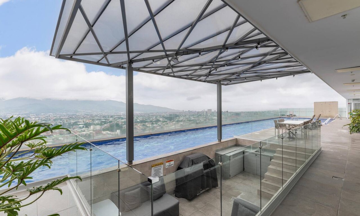 San Pedro Apartment | Tropical Vista iFreses, 2nd floor! AC, TV and Pool