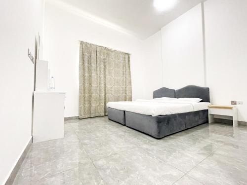 International City House | Warsan Star Residence - Home Stay