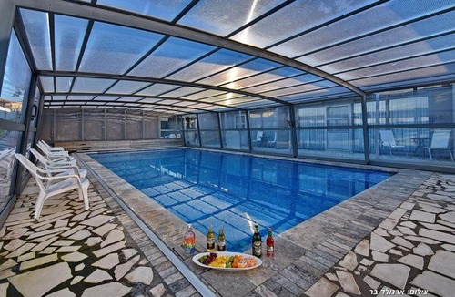 Dalton Apartment | סוויטות כחול לבן - בקתות וסוויטות מושלמות עם ג'קוזי פרטי ובריכה מחוממת במתחם