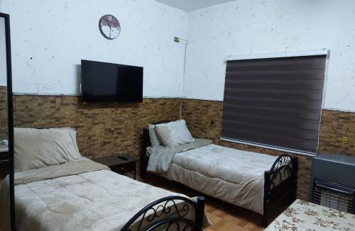 Jabal Al-Hussein Apartment | بيت الحجر 3