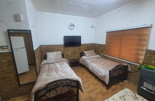 Jabal Al-Hussein Apartment | بيت الحجر 3