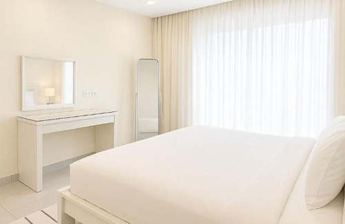 Al Ghubrah Ash Shamaliyyah Apartment | 1BHK top-floor with city view at Ghubra Beach