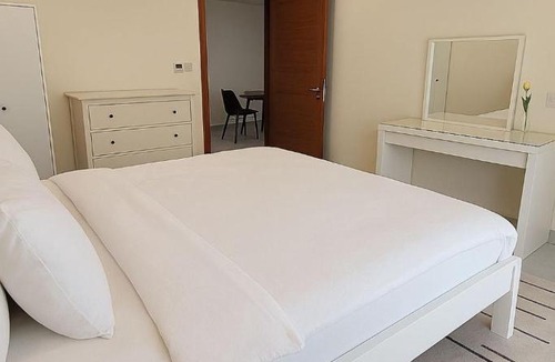 Al Ghubrah Ash Shamaliyyah Apartment | 1BHK top-floor with city view at Ghubra Beach