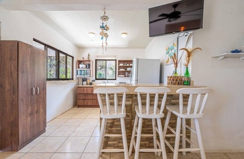 Coco Apartment | 2 Bedroom Delightful second-floor apartment with modern amenities , WiFi & Pool