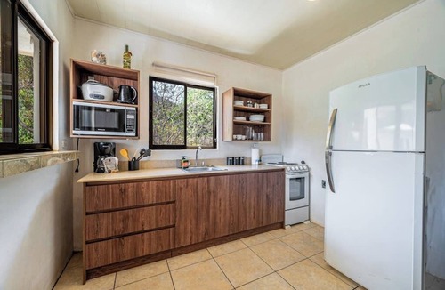 Coco Apartment | 2 Bedroom Delightful second-floor apartment with modern amenities , WiFi & Pool