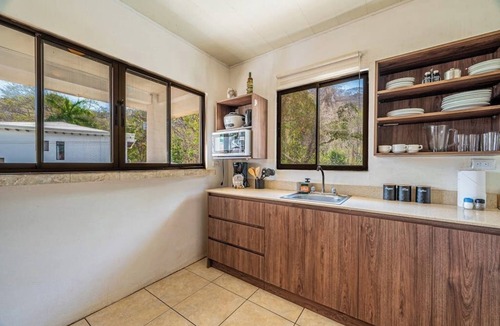 Coco Apartment | 2 Bedroom Delightful second-floor apartment with modern amenities , WiFi & Pool