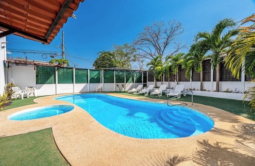 Coco Apartment | 2 Bedroom Delightful second-floor apartment with modern amenities , WiFi & Pool