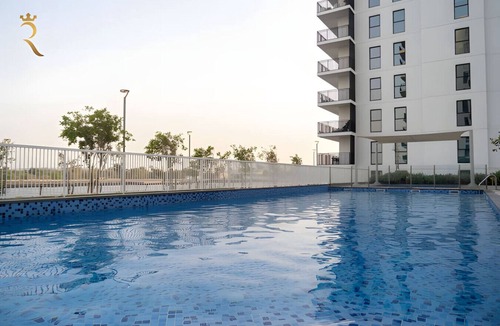 Abu Dhabi Apartment | 4BR Apt Water's Edge: Cozy Comfort & Modern Design