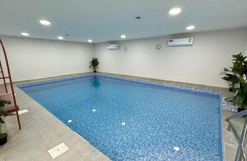 Salalah Ski Chalet | Al Hawli pool gathering