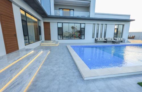 Musannah Resort | Al Tharaa Chalet استراحة الثراء