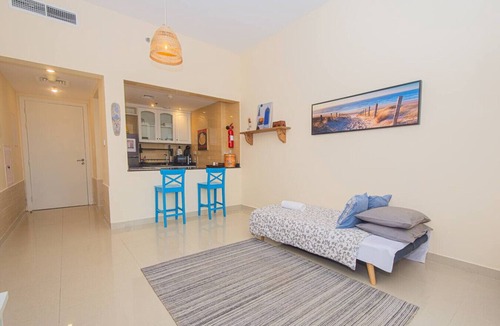 Al Hamra Village Apartment | Beachside Bliss Getaway