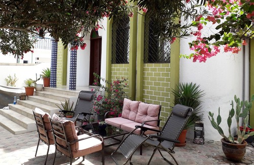 Muscat Villa | Beachside Bliss: Relax in Your Own Lush Tropical Garden Oasis, next to the beach