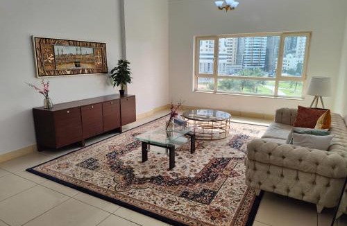 Al Majaz Apartment | Beautiful Levish 3-Bedroom Family Apartment with Garden View