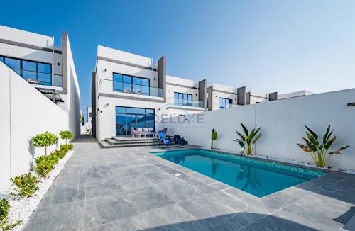 Sharm Apartment | Blue Marble Beach 4BR Villa with Assistants Room, Private Pool, Access to Floating Pier, and Sea and Mountain Views, Al Dana Island, Fujairah by Deluxe Holiday Homes