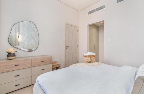 Dubai Production City Apartment | Bright and Modern 1BR Midtown Near Expo Site by Vibel