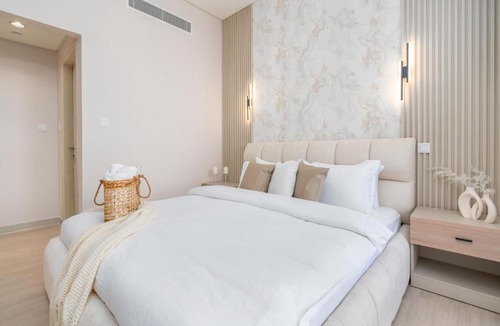 Dubai Production City Apartment | Bright and Modern 1BR Midtown Near Expo Site by Vibel