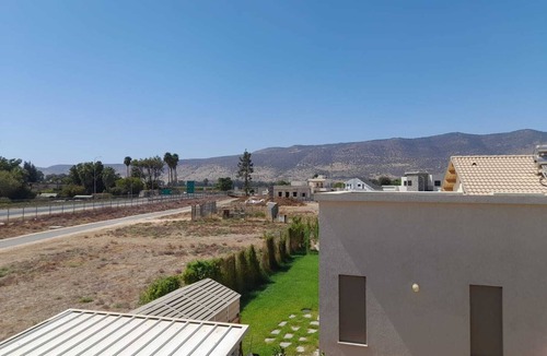 Bruchim Qela' Alon Apartment | Bright New 1-Bedroom Apartment with Balcony & Hermon View in Kibbutz
