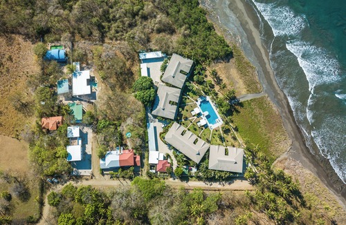 Junquillal House | Casa Breeze is a peaceful two-bedroom home with ocean breezes, a spacious terrace, and a beach that often feels like your own.