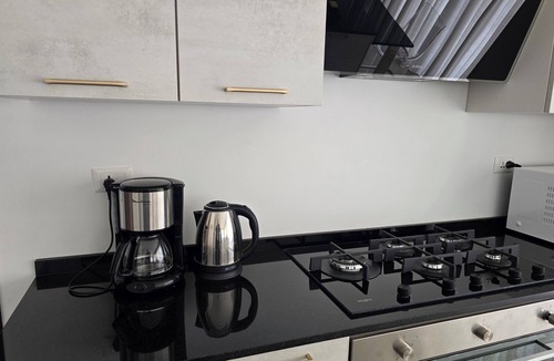 Suwailih Apartment | Charming 2-bedroom rooftop apartment with mountain view in Amman