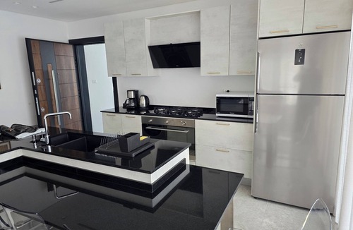 Suwailih Apartment | Charming 2-bedroom rooftop apartment with mountain view in Amman