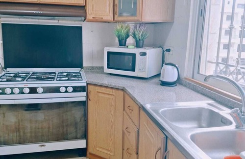 Suwailih Apartment | Charming 3-bedroom apartment with AC in vibrant Amman